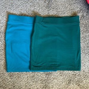 Two forever 21 bodycon skirts. Like new. Green and blue.